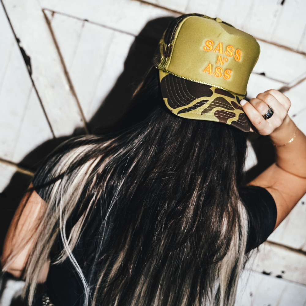 Sass N' Ass Green Camo Hat- Orange Logo