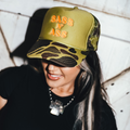 Sass N' Ass Green Camo Hat- Orange Logo